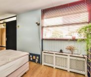 Bedroom with sheer window shades